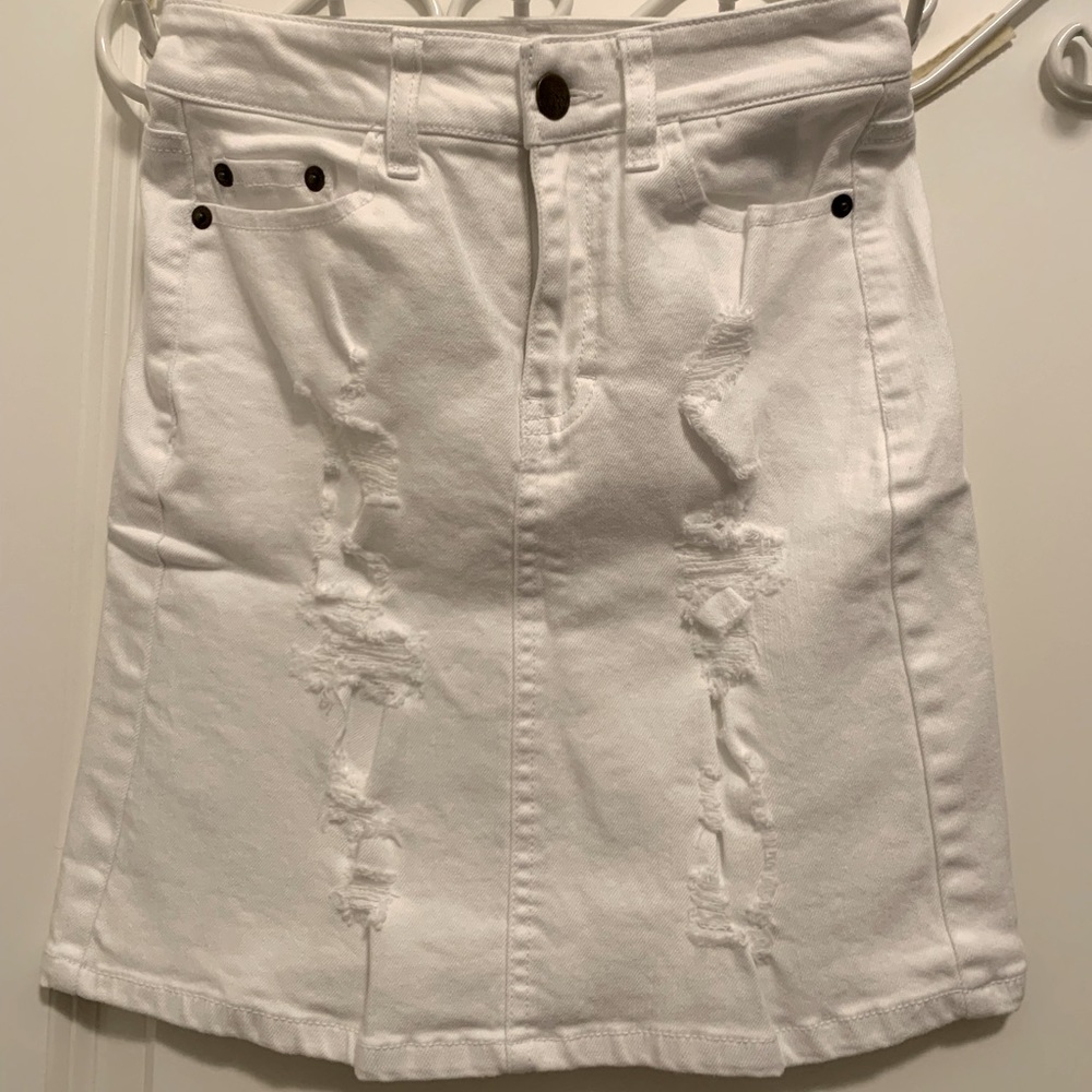 Destructed white mini skirt